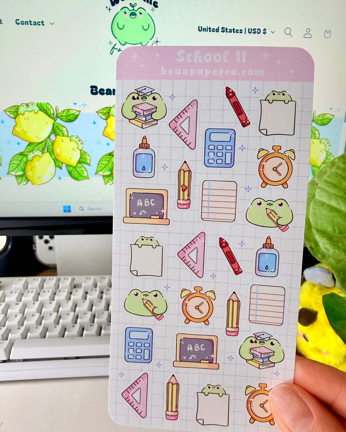 Cute School Frog Sticker Sheet featuring frogs with books and graduation caps, calculators, glue bottles, alarm clocks, chalkboards, and triangle rulers.