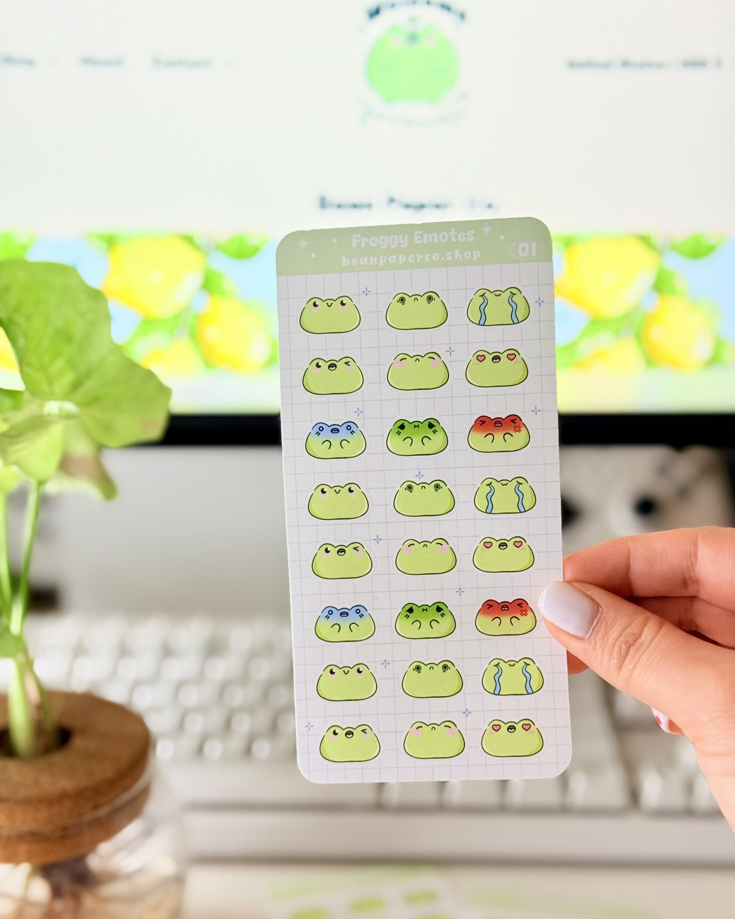 Cute Frog Emote Planner Stickers featuring cute green frog faces with different expressions including happy, blushing, crying, angry, and heart eyes.