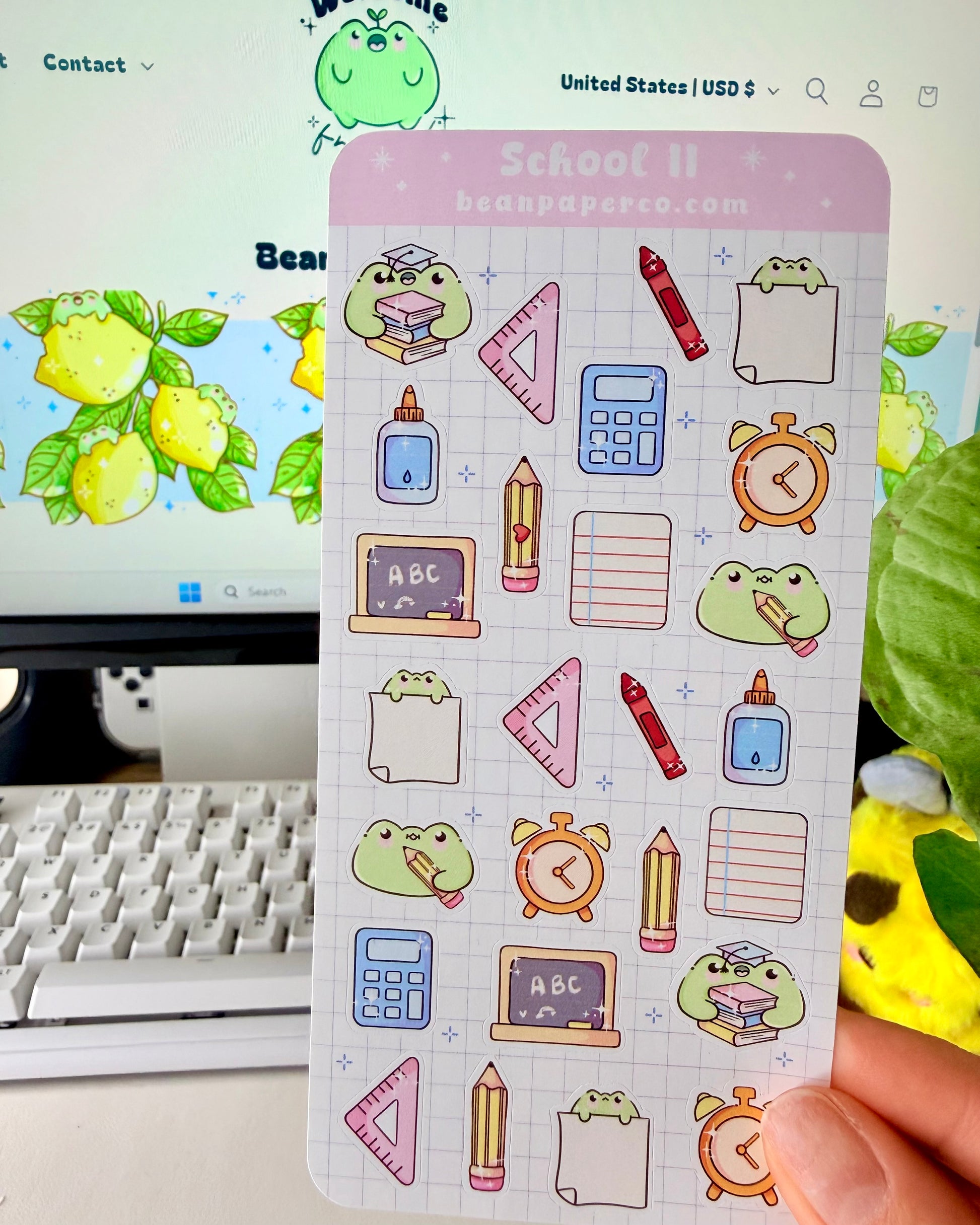 Cute School Frog Sticker Sheet featuring frogs with books and graduation caps, calculators, glue bottles, alarm clocks, chalkboards, and triangle rulers.