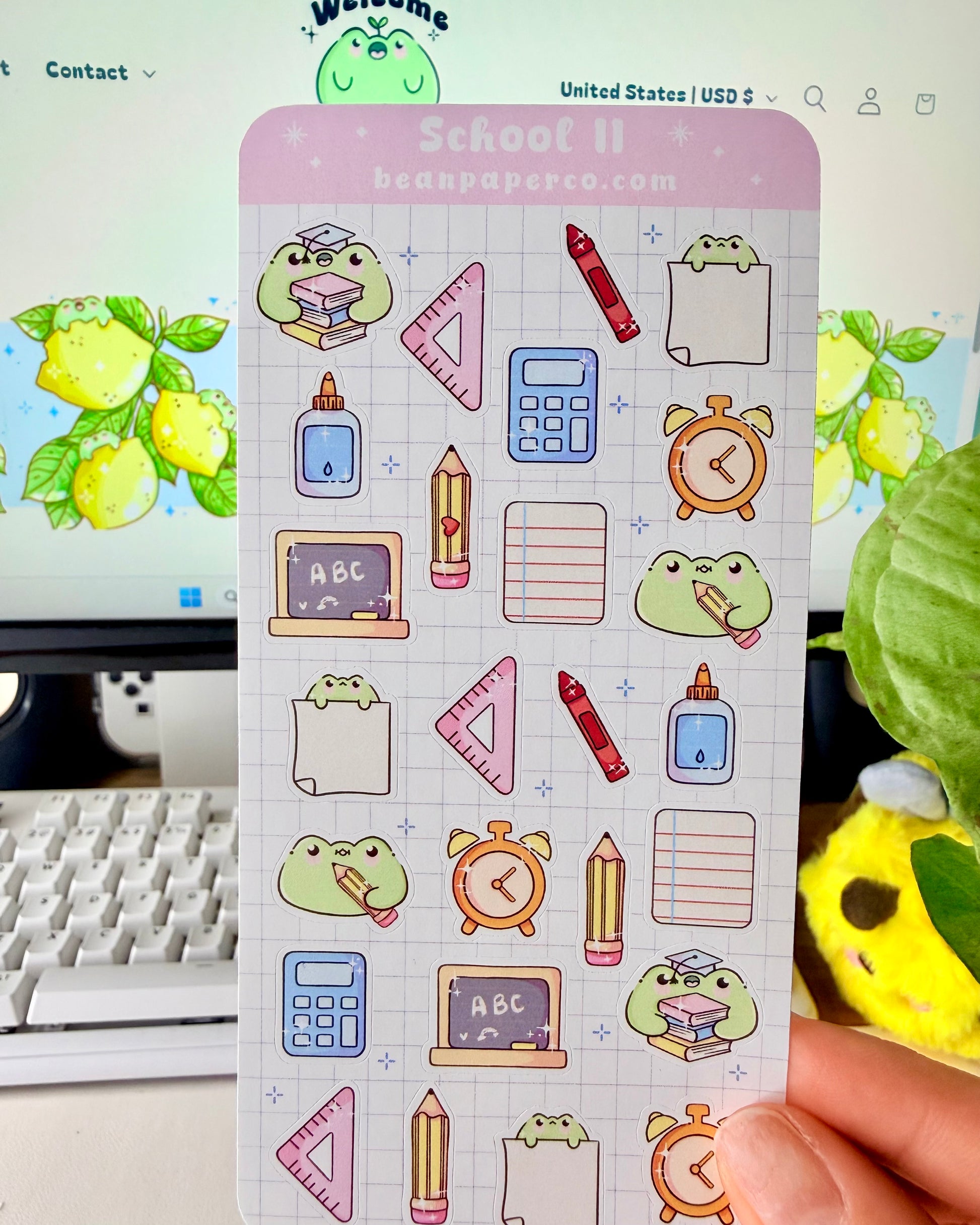 Cute School Frog Sticker Sheet featuring frogs with books and graduation caps, calculators, glue bottles, alarm clocks, chalkboards, and triangle rulers.