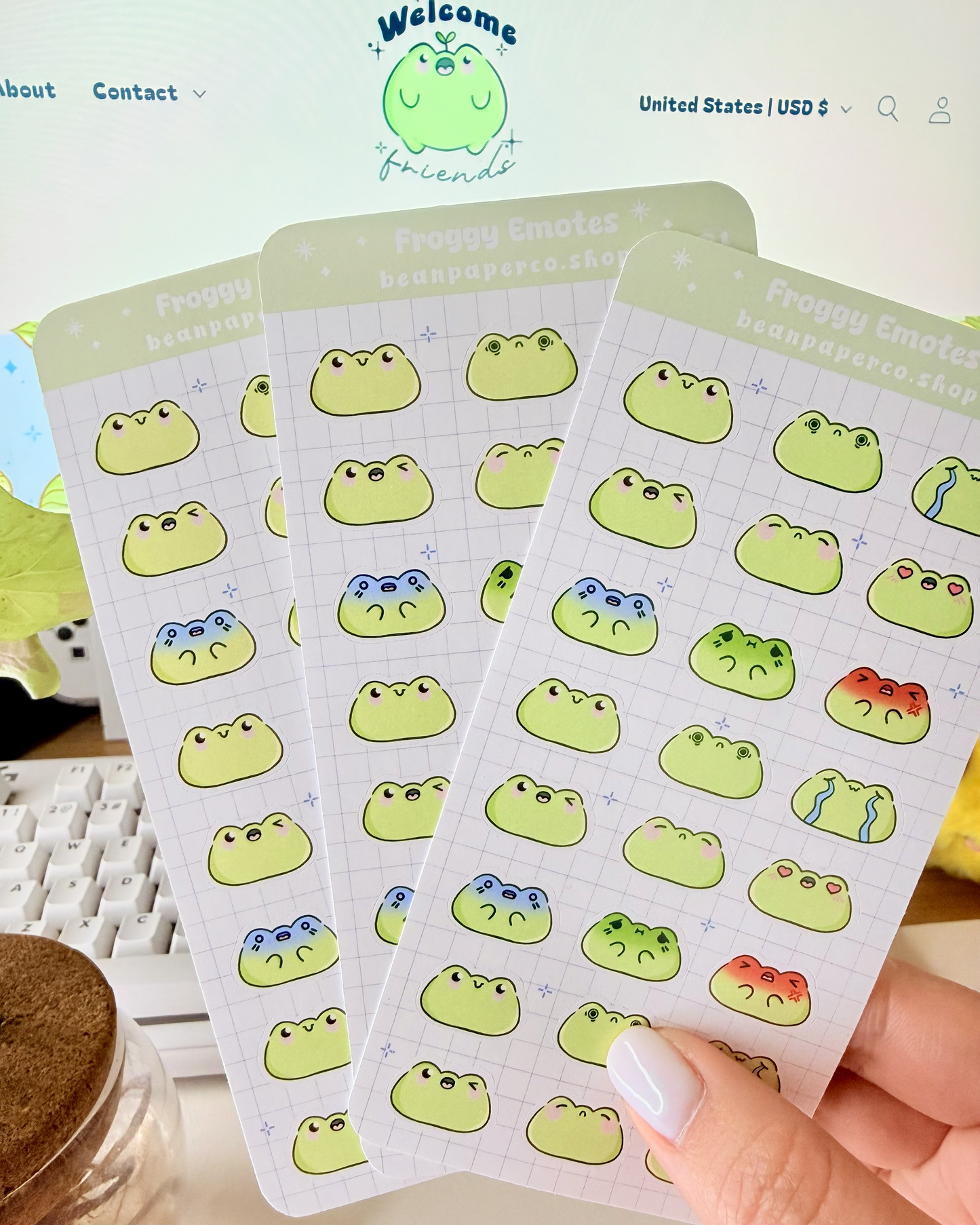 Cute Frog Emote Planner Stickers featuring cute green frog faces with different expressions including happy, blushing, crying, angry, and heart eyes.