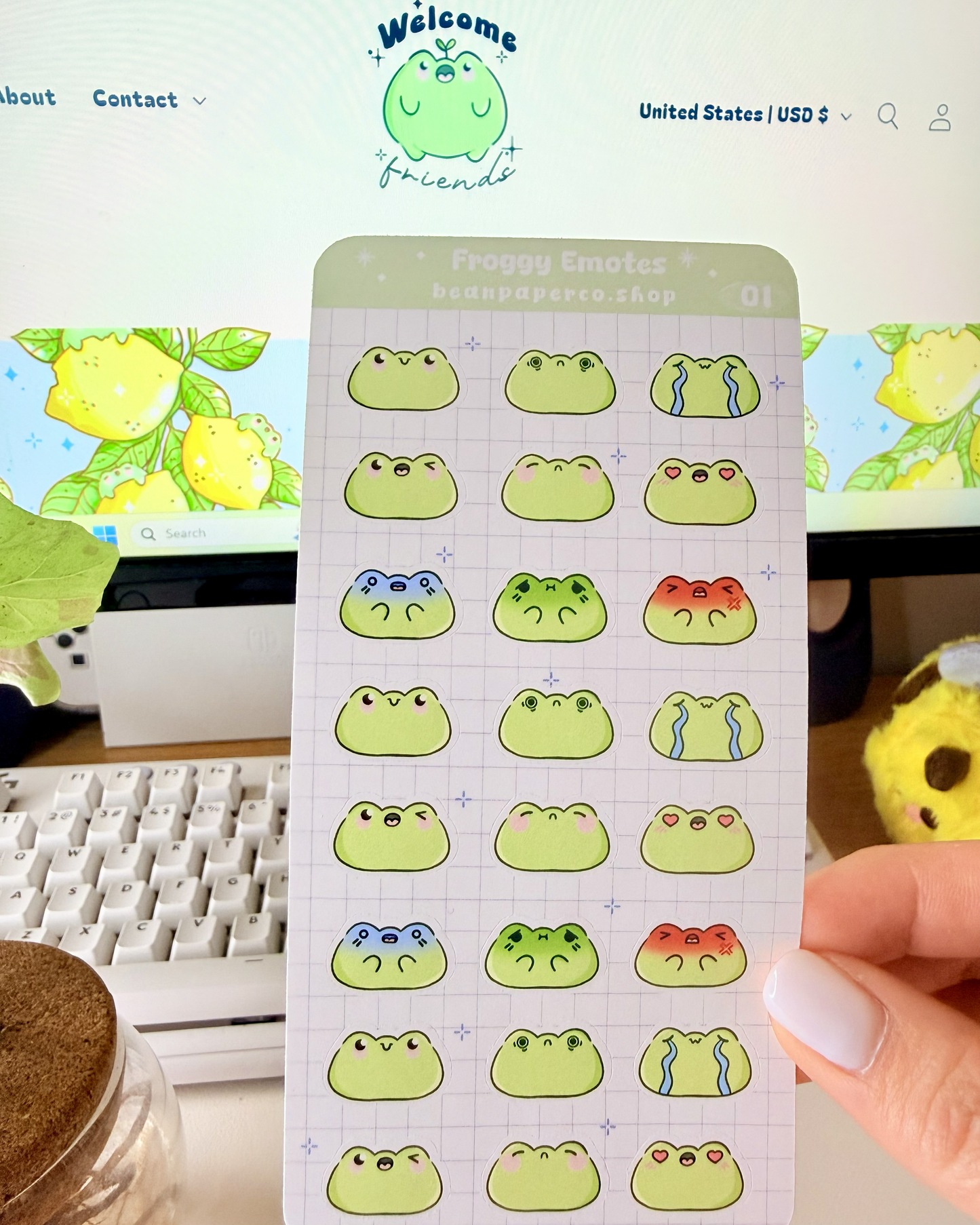 Cute Frog Emote Planner Stickers featuring cute green frog faces with different expressions including happy, blushing, crying, angry, and heart eyes.
