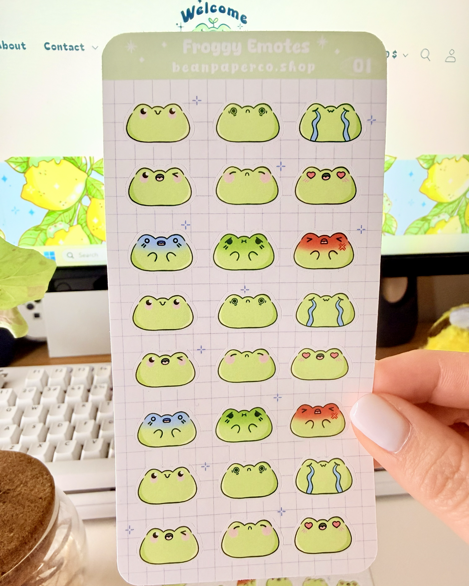 Cute Frog Emote Planner Stickers featuring cute green frog faces with different expressions including happy, blushing, crying, angry, and heart eyes.