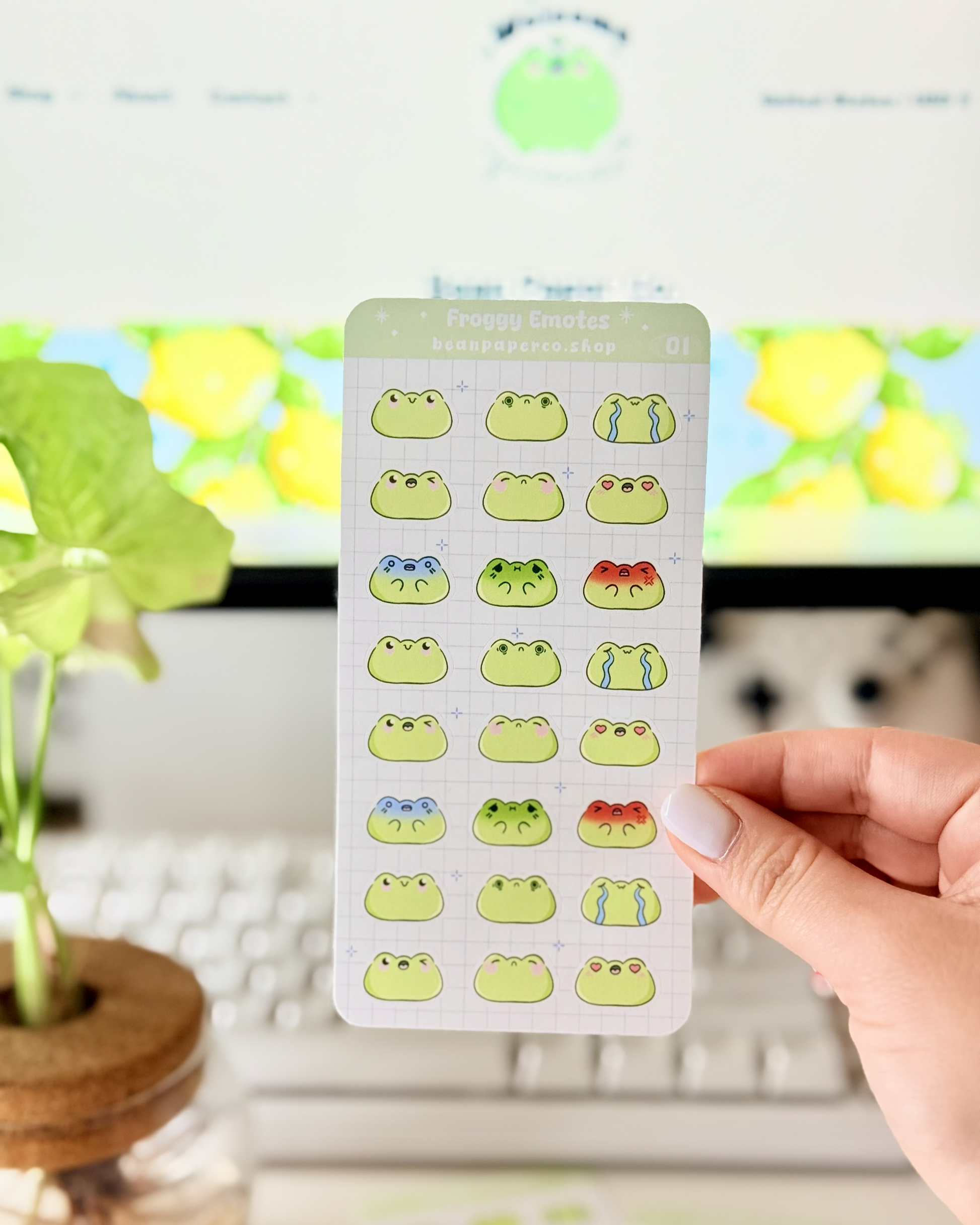 Cute Frog Emote Planner Stickers featuring cute green frog faces with different expressions including happy, blushing, crying, angry, and heart eyes.