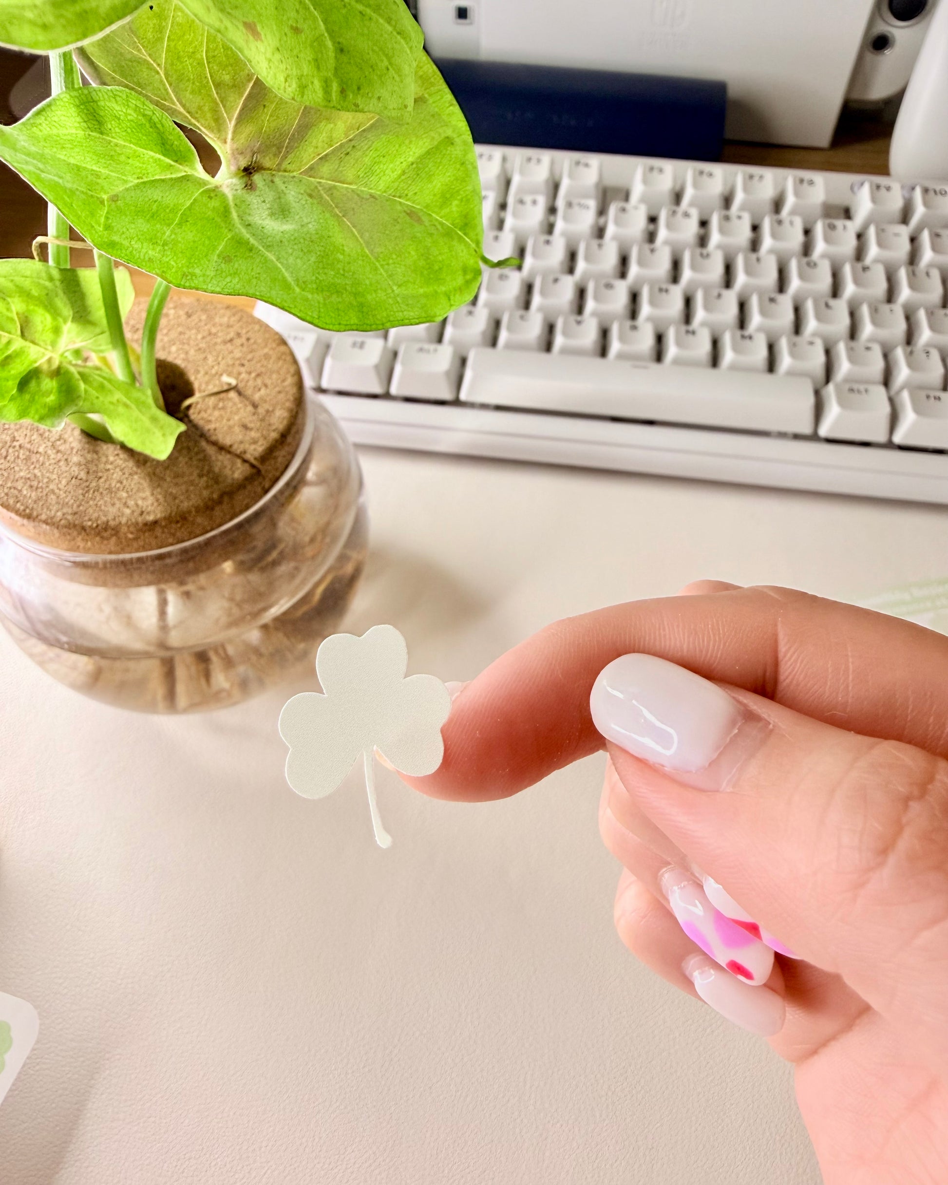 Cute March Clover Sticker Sheet hand holding single green clover