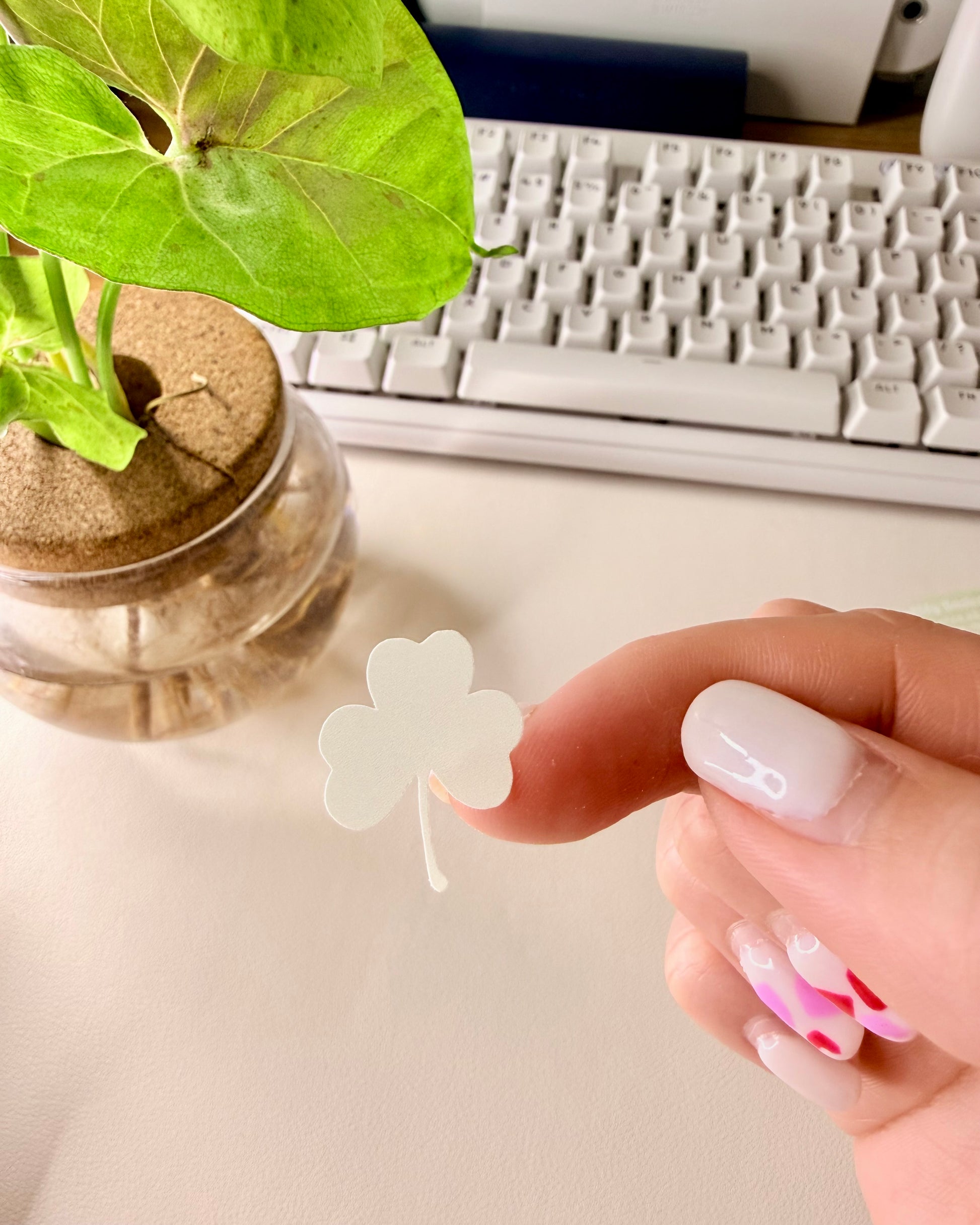 Cute March Clover Sticker Sheet hand holding single green clover