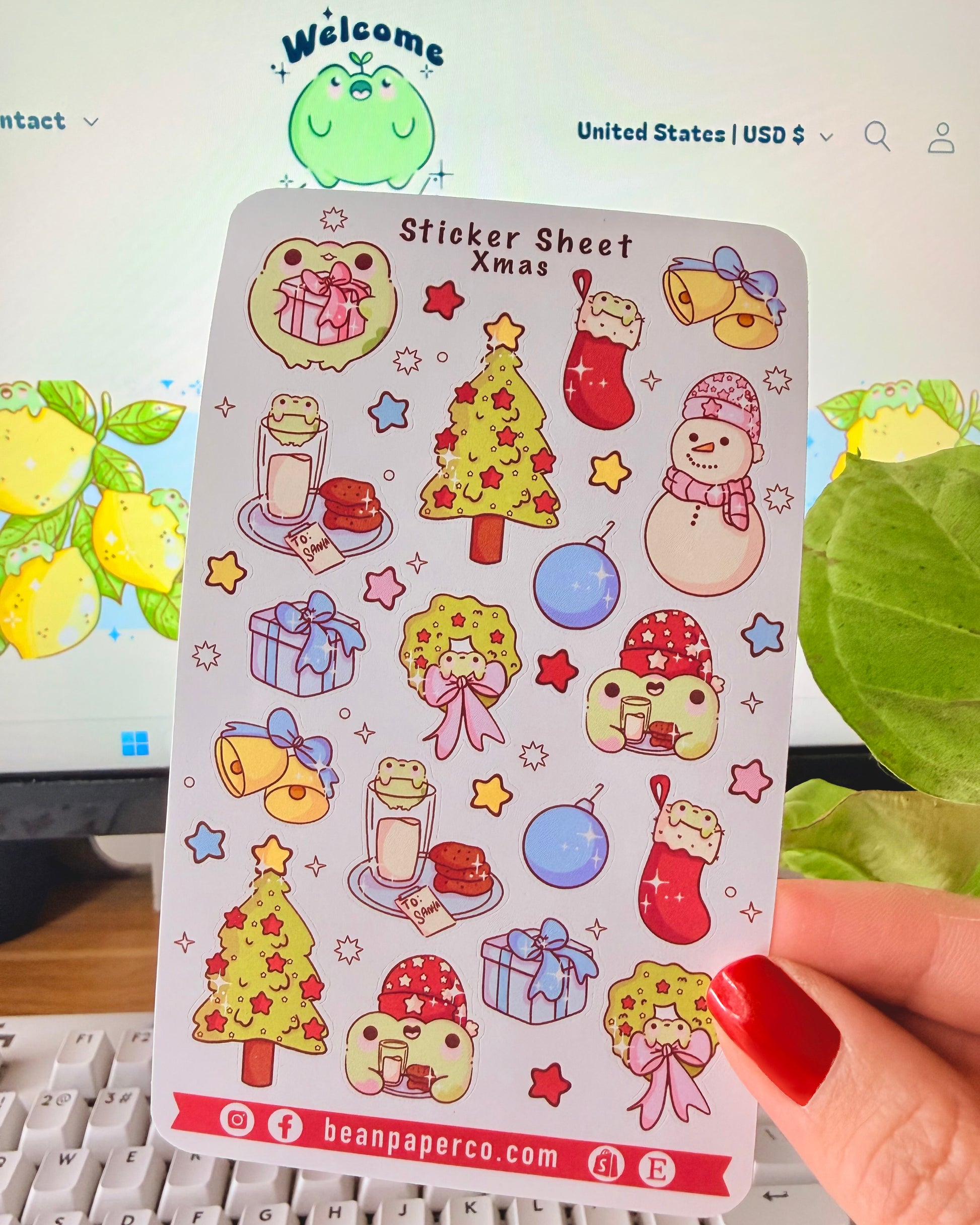 “Christmas frog sticker sheet featuring holiday tree, wreath, stockings, snowman, gifts, and festive frog characters.”